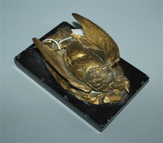 19 Century French gilt bronze paperweight modelled as a dead songbird, on marble base